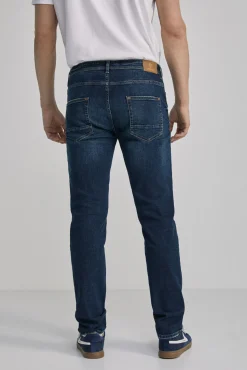 * Jeans Slim Lavado Oscuro Ensuciado Turquesa