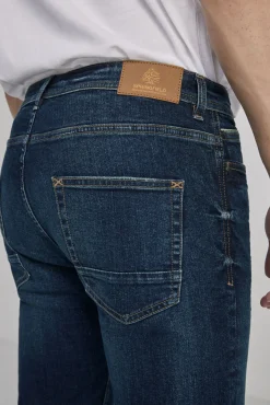 * Jeans Slim Lavado Oscuro Ensuciado Turquesa